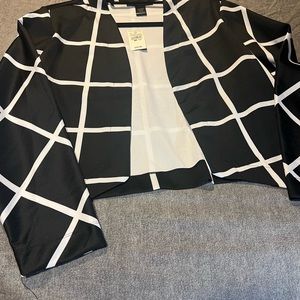 Black blazer with white lines.